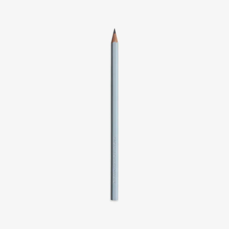 A single light blue cedar wood pencil with a sharp point, standing upright on a white background.