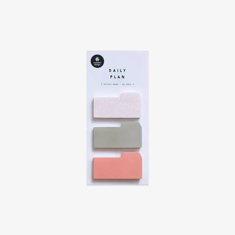Set of three small sticky notes in white, gray, and coral on a white background with 'Daily Plan' packaging.