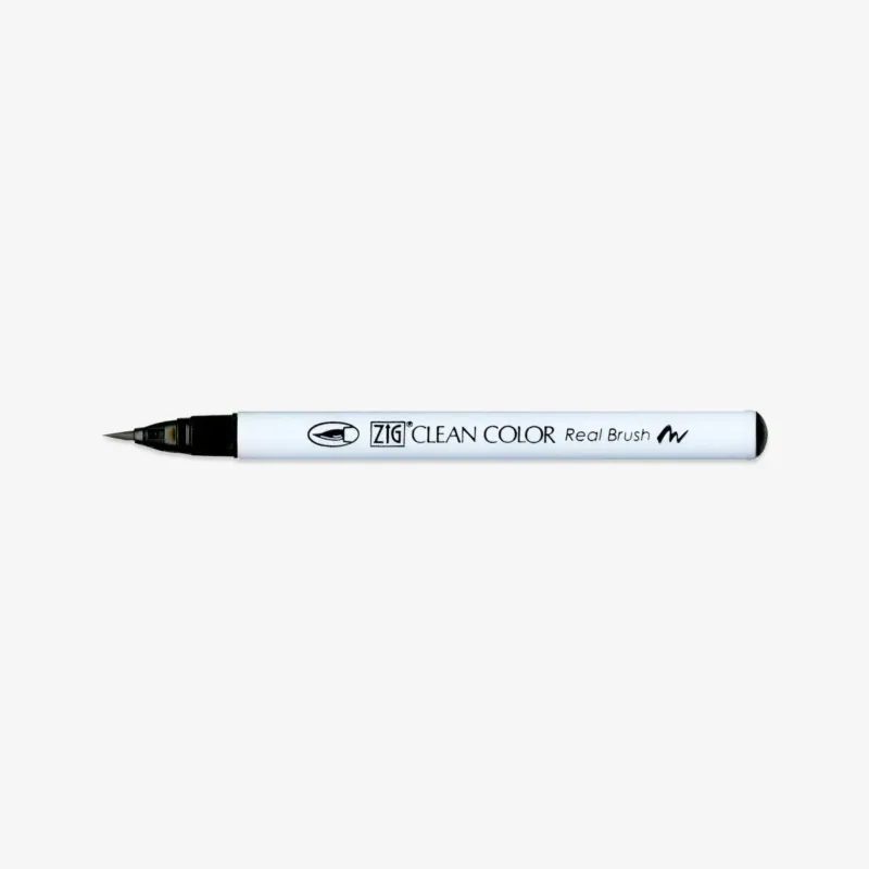 A ZIG Clean Color Real Brush marker pen with a black tip and black end cap, set horizontally against a plain light gray background.